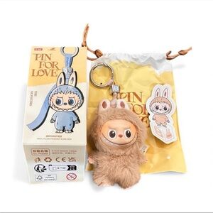 Pin for Love Plush (B) Authentic Labubu pendent in Brown.